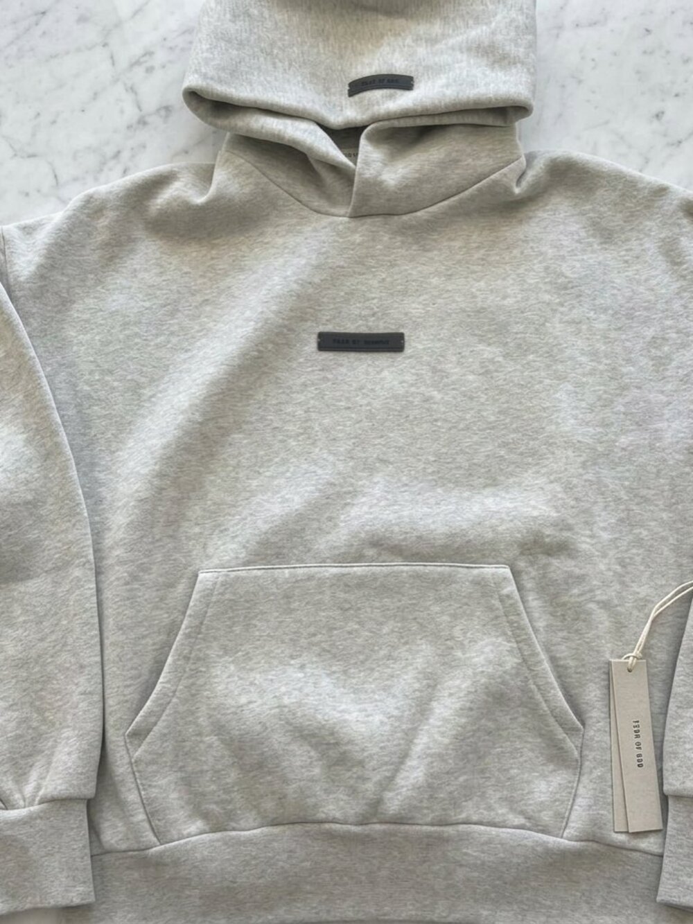 Essentials SS25 Heather Stone Hoodie